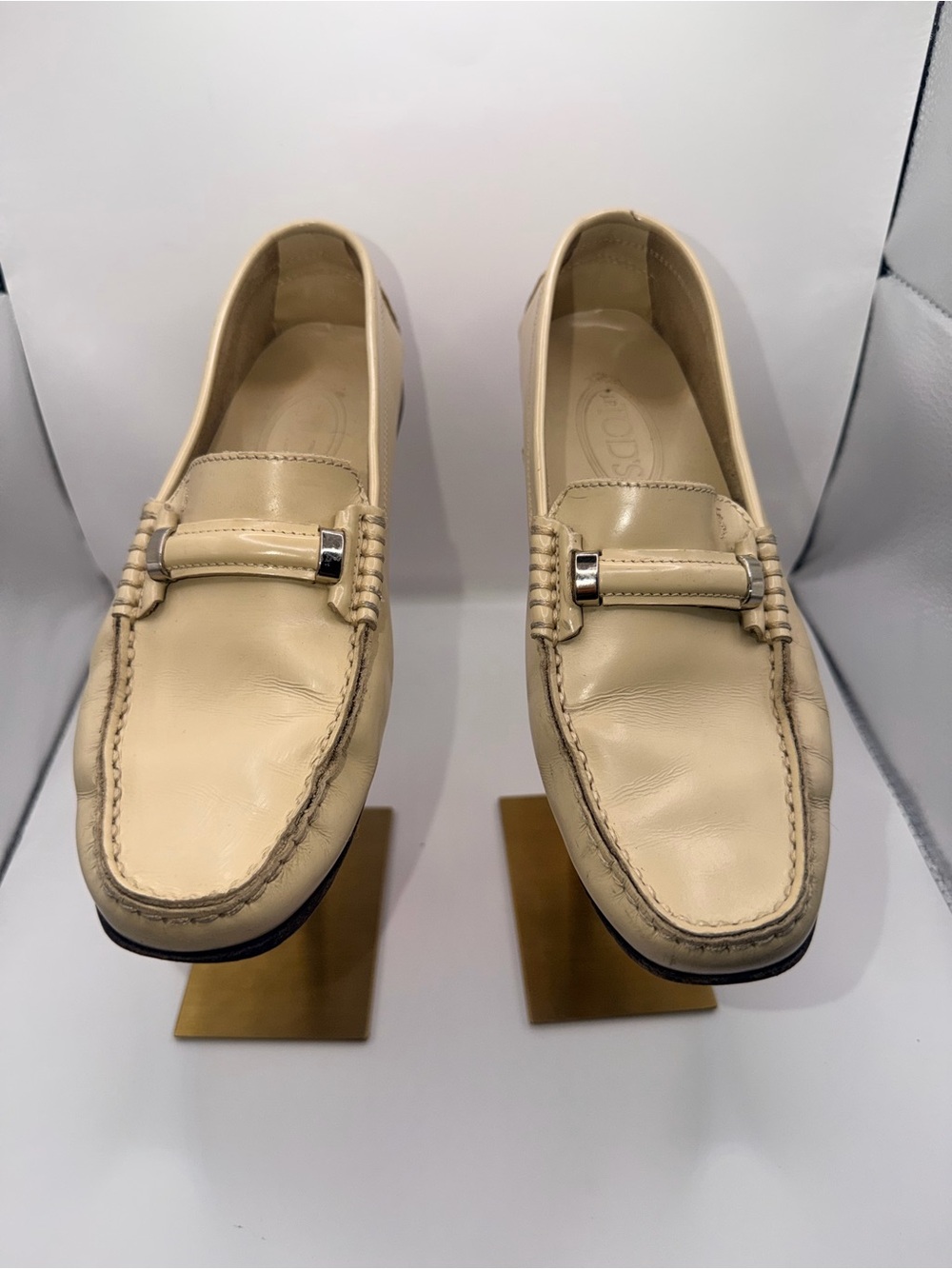 Tod's Beige Leather Women's Loafers with Silver Bit